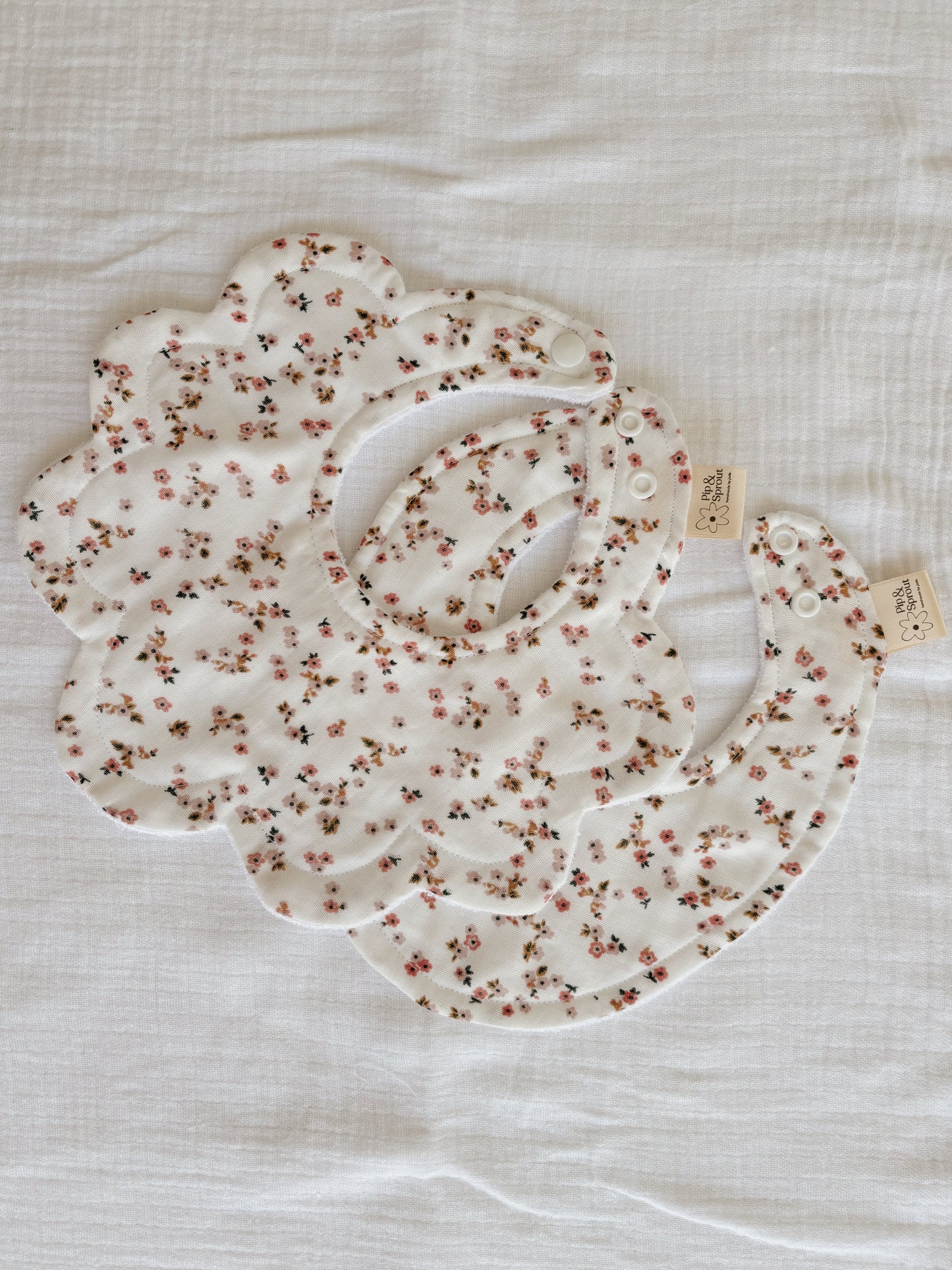 Organic cotton handmade daisy print bib with bamboo terry