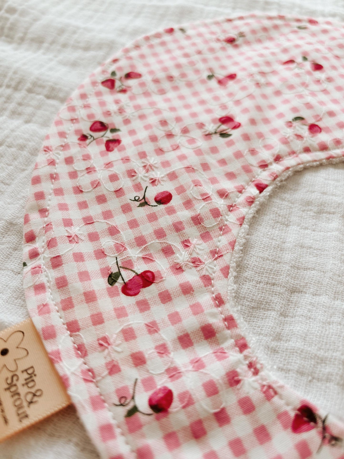 Cherry Pie Dribble Bib – Pink Gingham with Cherries | Handmade Baby Bib with Bamboo Backing